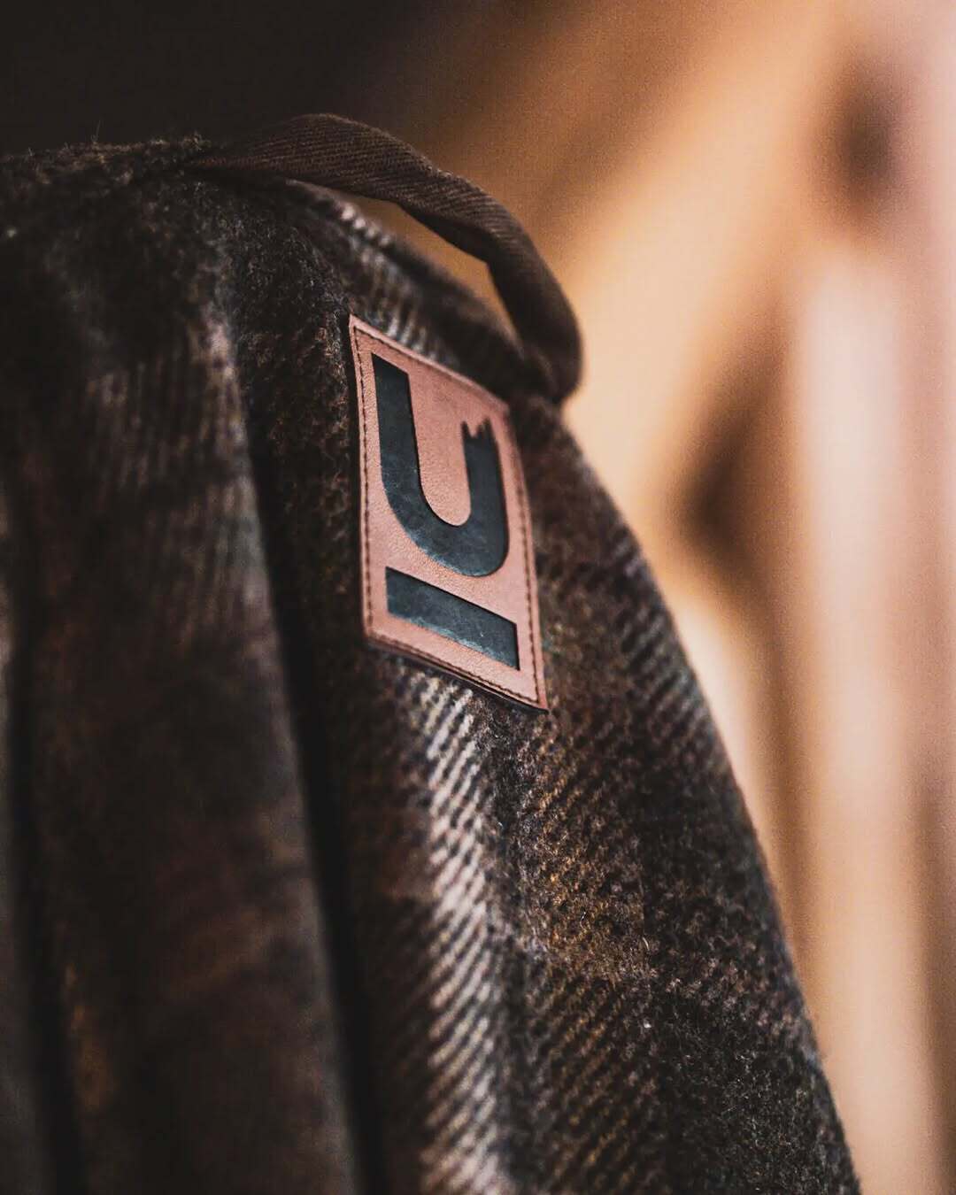 uomo outdoors brand logo design